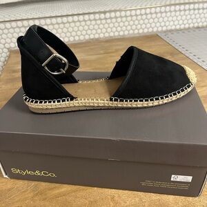Brand new never worn black leather high quality flats with an espadrille feel.